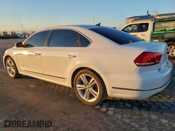 ✅ 2014 Volkswagen Passat SEL Premium • VIN: 1VWCN7A36EC071237 • Lot: 93749845. Listed on Copart with 163,448 mi. Free auction sales archive from the USA and detailed vehicle history report at DreamBid. Image 2.