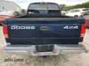 2002 Dodge Dakota SLT z VIN 1B7HG48N42S711374, wystawiony jako Copart lot #68991894 z przebiegiem Nie podano mil oraz Czysty tytuł • Clean title. Historia ofert i sprzedaży dostępna na DreamBid. Obrazek 6.