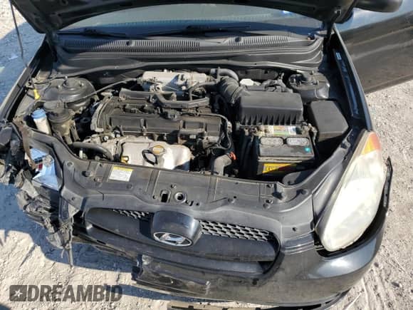 2010 Hyundai Accent SE z VIN KMHCN3AC8AU176891, wystawiony jako Copart lot #74906584 z przebiegiem 181 452 mil mil oraz Szkoda całkowita • Salvage title. Historia ofert i sprzedaży dostępna na DreamBid. Obrazek 12.