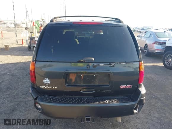 ✅ 2006 GMC Envoy SLT • VIN: 1GKDS13S262197642 • Lot: 42694689. Listed on IAAI with 130,620 mi. Free auction sales archive from the USA and detailed vehicle history report at DreamBid. Image 6.