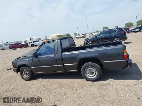 ✅ 1992 Mitsubishi Mighty Max • VIN: JA7FL24W9NP021503 • Lot: 41942559. Listed on IAAI with 162,088 mi. Free auction sales archive from the USA and detailed vehicle history report at DreamBid. Image 14.