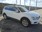 ✅ 2018 Volkswagen Tiguan S • VIN: 3VV1B7AX7JM081081 • Lot: 91599275. Listed on Copart with 56,400 mi. Free auction sales archive from the USA and detailed vehicle history report at DreamBid. Image 4.