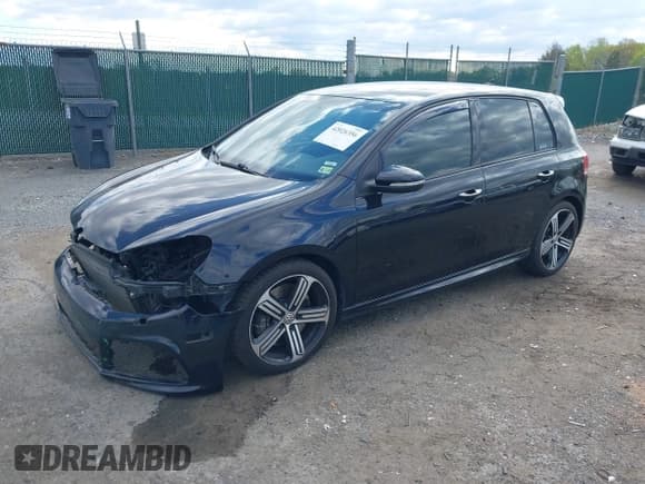 ✅ 2012 Volkswagen Golf R w/Sunroof & Navi • VIN: WVWPF7AJ2CW342189 • Лот: 42026356. Опубликован ранее на IAAI с пробегом 160 739 миль. Бесплатный доступ к архиву аукционных продаж из США и подробный отчёт об истории автомобиля на DreamBid. Изображение 2.