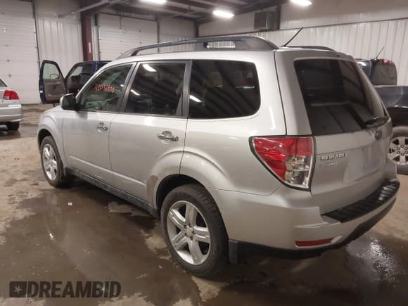 ✅ 2010 Subaru Forester X Premium • VIN: JF2SH6CC5AH710879 • Lot: 42036900. Listed on IAAI with 142,842 mi. Free auction sales archive from the USA and detailed vehicle history report at DreamBid. Image 3.