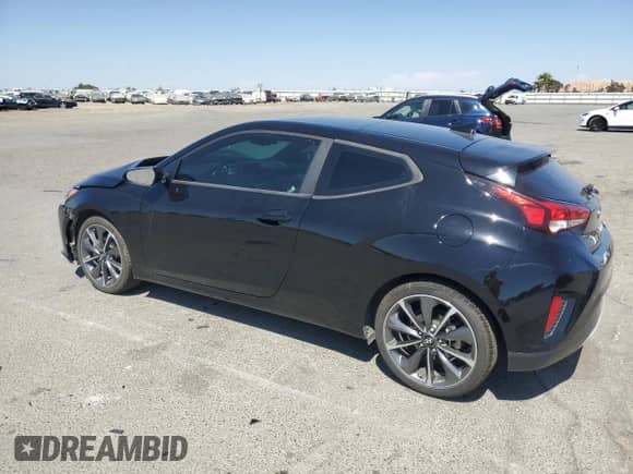 2020 Hyundai Veloster Premium z VIN KMHTG6AF6LU029753, wystawiony jako Copart lot #62052255 z przebiegiem 128 615 mil mil oraz Szkoda całkowita • Salvage title. Historia ofert i sprzedaży dostępna na DreamBid. Obrazek 2.