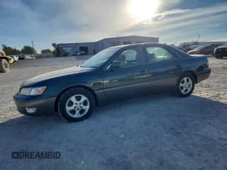 ✅ 1999 Lexus ES 300 • VIN: JT8BF28G2X0216090 • Lot: 92250495. Listed on Copart with 133,209 mi. Free auction sales archive from the USA and detailed vehicle history report at DreamBid. Image 1.