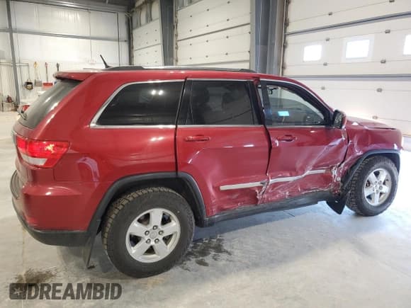 ✅ 2011 Jeep Grand Cherokee Laredo • VIN: 1J4RR4GGXBC575869 • Lot: 56389475. Listed on Copart with 131,204 mi. Free auction sales archive from the USA and detailed vehicle history report at DreamBid. Image 3.