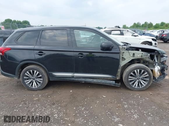 ✅ 2019 Mitsubishi Outlander ES • VIN: JA4AZ3A39KZ055673 • Lot: 42459555. Listed on IAAI with 97,433 mi. Free auction sales archive from the USA and detailed vehicle history report at DreamBid. Image 14.