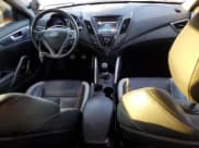 ✅ 2013 Hyundai Veloster Turbo • VIN: KMHTC6AE1DU105772 • Lot: 87949065. Wystawiony na Copart z przebiegiem 125 764 mil. Bezpłatny archiwum sprzedaży aukcyjnych z USA i szczegółowy raport historii pojazdu na DreamBid. Zdjęcie 8.