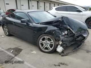 2006 Hyundai Tiburon GT z VIN KMHHN65F66U215304, wystawiony jako Copart lot #56141635 z przebiegiem 149 118 mil mil oraz Szkoda całkowita • Salvage title. Historia ofert i sprzedaży dostępna na DreamBid. Obrazek 4.