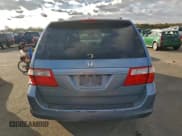 ✅ 2006 Honda Odyssey EX-L • VIN: 5FNRL38776B070297 • Лот: 95570655. Опубликован ранее на Copart с пробегом 124 763 миль. Бесплатный доступ к архиву аукционных продаж из США и подробный отчёт об истории автомобиля на DreamBid. Изображение 6.