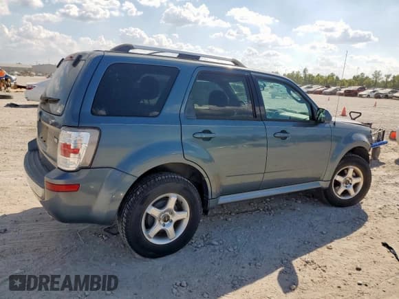 ✅ 2011 Mercury Mariner Premier • VIN: 4M2CN8HG9BKJ08665 • Lot: 85329905. Listed on Copart with 123,967 mi. Free auction sales archive from the USA and detailed vehicle history report at DreamBid. Image 3.