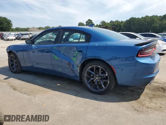 ✅ 2023 Dodge Charger SXT • VIN: 2C3CDXBG9PH603981 • Lot: 70631175. Listed on Copart with 27,114 mi. Free auction sales archive from the USA and detailed vehicle history report at DreamBid. Image 2.