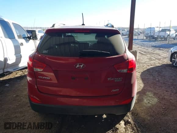 2010 Hyundai Tucson GLS with VIN KM8JUCAC8AU057801, listed as a IAAI auction lot 41037140 with 115,529 mi miles and . Bid and sale history available at DreamBid. Image 16.