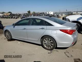 ✅ 2014 Hyundai Sonata SE • VIN: 5NPEC4AC3EH839809 • Lot: 74275544. Listed on Copart with 117,367 mi. Free auction sales archive from the USA and detailed vehicle history report at DreamBid. Image 2.