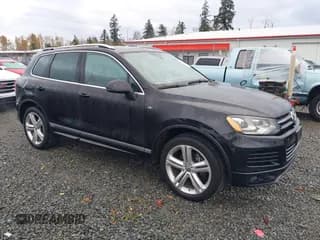 ✅ 2014 Volkswagen Touareg R-Line • VIN: WVGDP9BP8ED010170 • Lot: 43751076. Listed on IAAI with 78,022 mi. Free auction sales archive from the USA and detailed vehicle history report at DreamBid. Image 1.