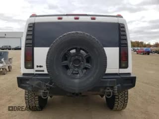 ✅ 2003 Hummer H2 • VIN: 5GRGN23U33H117201 • Лот: 78998864. Опубликован ранее на Copart с пробегом 279 930 миль. Бесплатный доступ к архиву аукционных продаж из США и подробный отчёт об истории автомобиля на DreamBid. Изображение 6.
