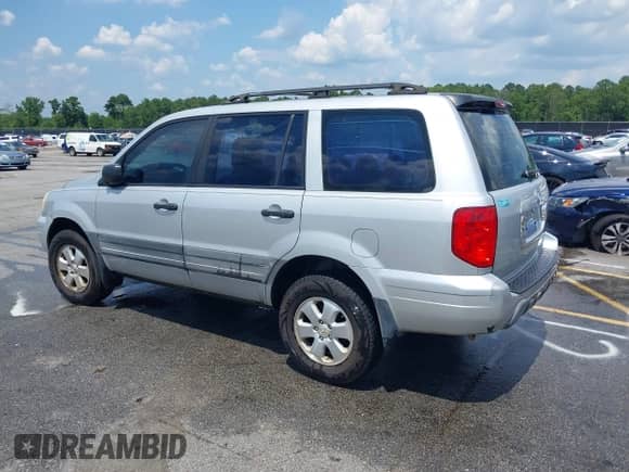 2003 Honda Pilot LX with VIN 2HKYF18193H571563, listed as a IAAI auction lot 42577524 with 198,414 mi miles and . Bid and sale history available at DreamBid. Image 3.