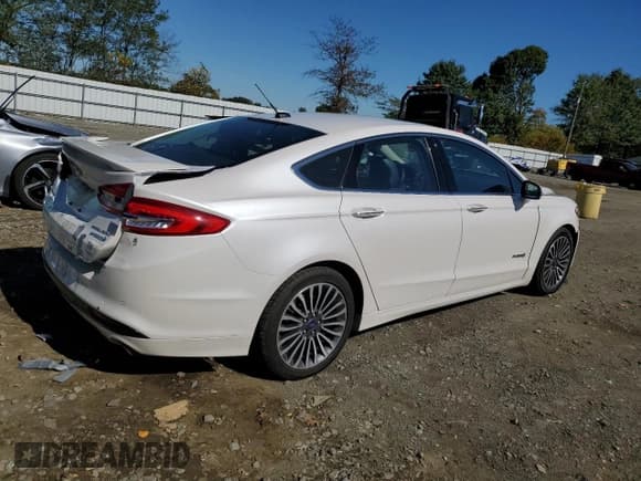 ✅ 2018 Ford Fusion Titanium • VIN: 3FA6P0RU4JR162846 • Лот: 85143595. Опубликован ранее на Copart с пробегом 209 868 миль. Бесплатный доступ к архиву аукционных продаж из США и подробный отчёт об истории автомобиля на DreamBid. Изображение 3.