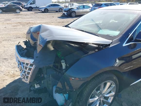 ✅ 2014 Cadillac XTS Luxury • VIN: 2G61M5S33E9134448 • Lot: 43712982. Listed on IAAI with 36,875 mi. Free auction sales archive from the USA and detailed vehicle history report at DreamBid. Image 18.