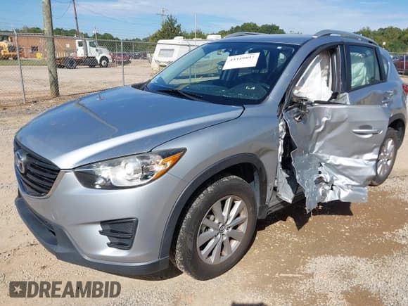 ✅ 2016 Mazda CX-5 Sport • VIN: JM3KE2BY0G0816281 • Lot: 43349897. Listed on IAAI with 73,030 mi. Free auction sales archive from the USA and detailed vehicle history report at DreamBid. Image 17.