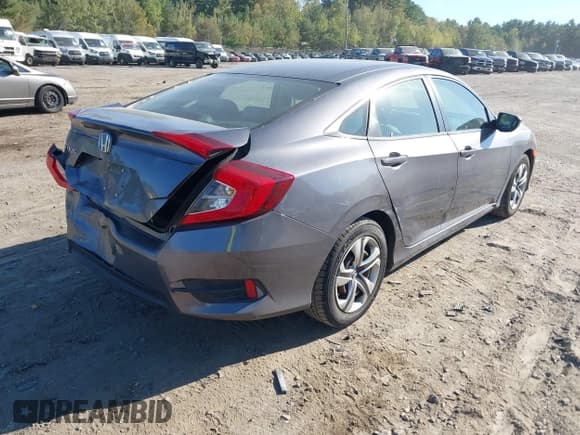 ✅ 2018 Honda Civic LX • VIN: 19XFC2F51JE203293 • Lot: 43380270. Listed on IAAI with 84,439 mi. Free auction sales archive from the USA and detailed vehicle history report at DreamBid. Image 4.