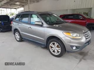 ✅ 2011 Hyundai Santa Fe SE • VIN: 5XYZHDAG1BG038711 • Lot: 43118565. Listed on IAAI with 165,744 mi. Free auction sales archive from the USA and detailed vehicle history report at DreamBid. Image 1.