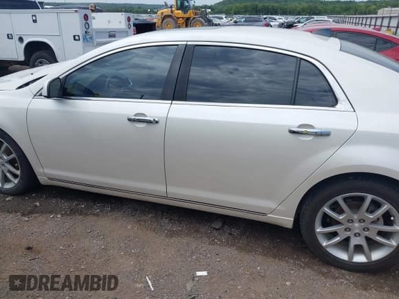 ✅ 2012 Chevrolet Malibu LTZ • VIN: 1G1ZG5E76CF151814 • Lot: 42790287. Listed on IAAI with 145,850 mi. Free auction sales archive from the USA and detailed vehicle history report at DreamBid. Image 14.