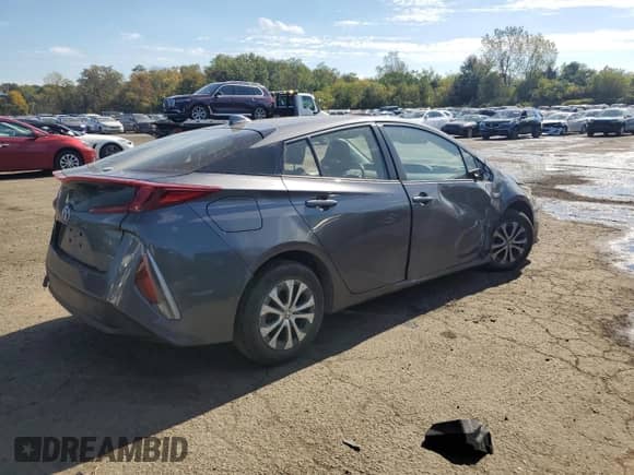 2022 Toyota Prius LE с VIN JTDKAMFP8N3228240, выставлен на аукционе Copart как лот 84977275 с пробегом Не указан миль и Списание • Salvage title. История ставок и продаж доступна на DreamBid. Изображение 3.