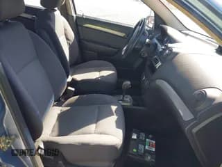 ✅ 2007 Chevrolet Aveo LS • VIN: KL1TD56637B113103 • Lot: 41706315. Wystawiony na IAAI z przebiegiem Nie podano. Bezpłatny archiwum sprzedaży aukcyjnych z USA i szczegółowy raport historii pojazdu na DreamBid. Zdjęcie 5.