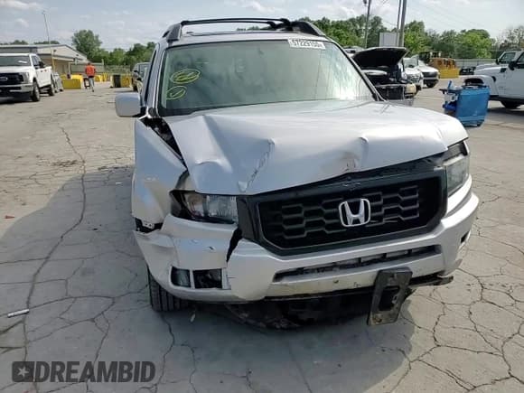 ✅ 2014 Honda Ridgeline SE • VIN: 5FPYK1F69EB013604 • Lot: 57229155. Listed on Copart with 128,358 mi. Free auction sales archive from the USA and detailed vehicle history report at DreamBid. Image 13.