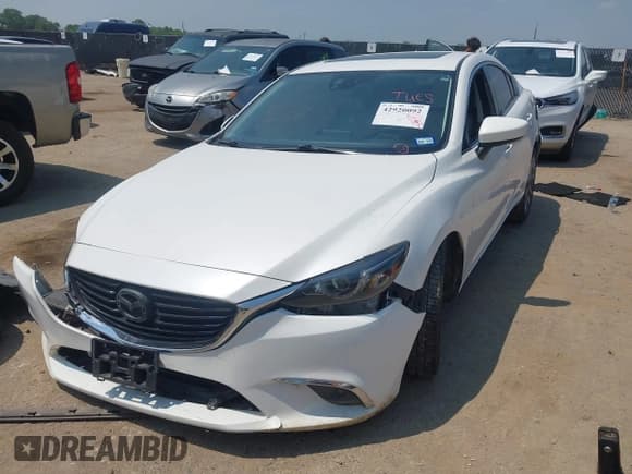 ✅ 2016 Mazda 6 i Grand Touring • VIN: JM1GJ1W58G1417293 • Lot: 42920092. Listed on IAAI with 125,756 mi. Free auction sales archive from the USA and detailed vehicle history report at DreamBid. Image 17.