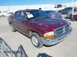 ✅ 2000 Dodge Dakota Sport • VIN: 1B7GL2AX8YS723964 • Lot: 43570529. Listed on IAAI with 136,989 mi. Free auction sales archive from the USA and detailed vehicle history report at DreamBid. Image 1.