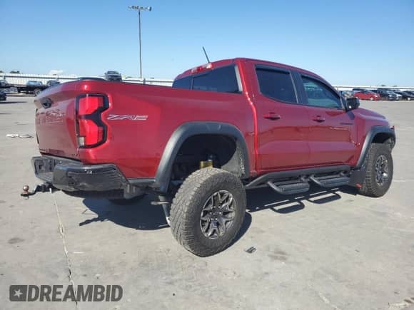 2023 Chevrolet Colorado 4WD ZR2 с VIN 1GCPTFEK2P1230663, выставлен на аукционе Copart как лот 69043564 с пробегом 5 927 миль миль и Списание • Salvage title. История ставок и продаж доступна на DreamBid. Изображение 3.