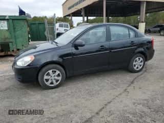 2008 Hyundai Accent GLS z VIN KMHCN46C88U277079, wystawiony jako Copart lot #77453424 z przebiegiem 63 933 mil mil oraz Szkoda całkowita • Salvage title. Historia ofert i sprzedaży dostępna na DreamBid. Obrazek 1.