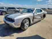 2009 Dodge Challenger R/T with VIN 2B3LJ54T79H602061, listed as a Copart auction lot 81770335 with 69,701 mi miles and Salvage title. Bid and sale history available at DreamBid. Image 1.