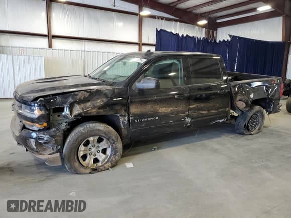 ✅ 2018 Chevrolet Silverado 1500 LT • VIN: 3GCUKREC2JG456291 • Лот: 60187564. Опубликован ранее на Copart с пробегом 93 977 миль. Бесплатный доступ к архиву аукционных продаж из США и подробный отчёт об истории автомобиля на DreamBid. Изображение 1.