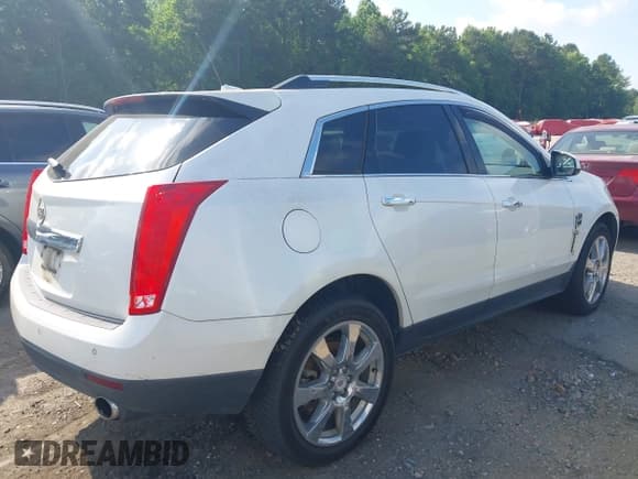 ✅ 2011 Cadillac SRX Performance Collection • VIN: 3GYFNBEY0BS546857 • Лот: 42435449. Опубликован ранее на IAAI с пробегом 183 445 миль. Бесплатный доступ к архиву аукционных продаж из США и подробный отчёт об истории автомобиля на DreamBid. Изображение 4.