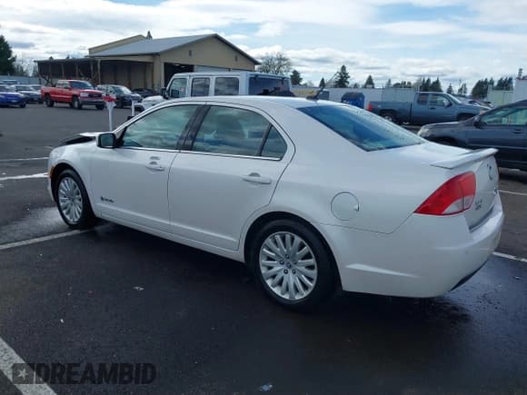 ✅ 2010 Mercury Milan Hybrid • VIN: 3MEDM0L39AR623032 • Lot: 41838164. Listed on IAAI with 134,715 mi. Free auction sales archive from the USA and detailed vehicle history report at DreamBid. Image 3.