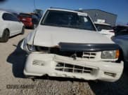 ✅ 1999 Isuzu Rodeo S • VIN: 4S2CM58W0X4306727 • Lot: 74758994. Listed on Copart with 193,850 mi. Free auction sales archive from the USA and detailed vehicle history report at DreamBid. Image 5.