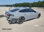 ✅ 2021 Audi RS 5 Sportback • VIN: WUAAWCF54MA903147 • Лот: 71985845. Опубликован ранее на Copart с пробегом 91 747 миль. Бесплатный доступ к архиву аукционных продаж из США и подробный отчёт об истории автомобиля на DreamBid. Изображение 3.