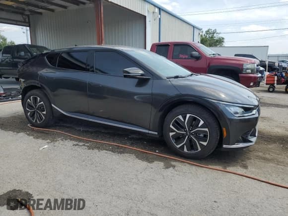 ✅ 2022 Kia EV6 Wind • VIN: KNDC34LA6N5060116 • Лот: 53617885. Опубликован ранее на Copart с пробегом 35 069 миль. Бесплатный доступ к архиву аукционных продаж из США и подробный отчёт об истории автомобиля на DreamBid. Изображение 4.