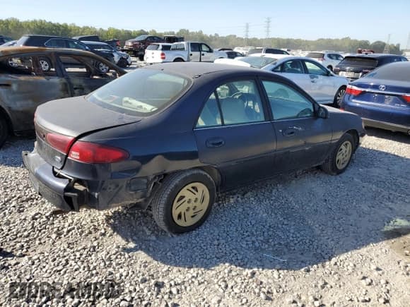 ✅ 2001 Ford Escort Fleet • VIN: 3FAFP13PX1R120920 • Lot: 75643024. Listed on Copart with 128,089 mi. Free auction sales archive from the USA and detailed vehicle history report at DreamBid. Image 3.