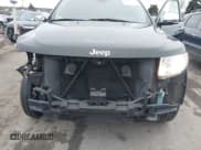 ✅ 2013 Jeep Grand Cherokee Limited • VIN: 1C4RJFBG1DC638568 • Lot: 43725371. Listed on IAAI with 142,436 mi. Free auction sales archive from the USA and detailed vehicle history report at DreamBid. Image 6.