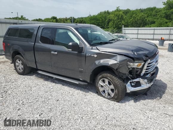 ✅ 2015 Ford F-150 XLT • VIN: 1FTEX1EP0FFB70569 • Lot: 57001665. Listed on Copart with 201,089 mi. Free auction sales archive from the USA and detailed vehicle history report at DreamBid. Image 4.