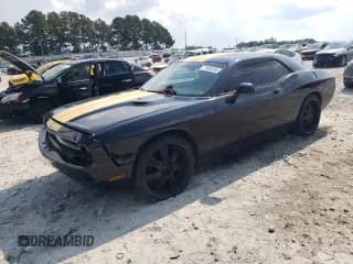 ✅ 2009 Dodge Challenger SE • VIN: 2B3LJ44V49H563599 • Lot: 71649265. Listed on Copart with 207,862 mi. Free auction sales archive from the USA and detailed vehicle history report at DreamBid. Image 1.