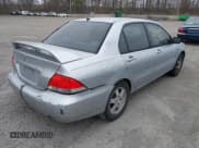 ✅ 2004 Mitsubishi Lancer LS • VIN: JA3AJ36E44U020349 • Lot: 41714325. Listed on IAAI with Not provided. Free auction sales archive from the USA and detailed vehicle history report at DreamBid. Image 4.