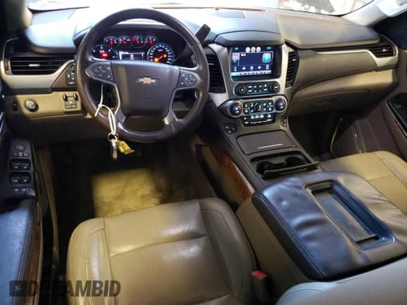 2015 Chevrolet Suburban LTZ с VIN 1GNSCKKC3FR291995, выставлен на аукционе Copart как лот 65895214 с пробегом 153 672 миль миль и Списание • Salvage title. История ставок и продаж доступна на DreamBid. Изображение 8.