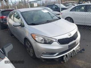 ✅ 2014 Kia Forte EX • VIN: KNAFX4A80E5074625 • Lot: 43787179. Listed on IAAI with 153,005 mi. Free auction sales archive from the USA and detailed vehicle history report at DreamBid. Image 1.