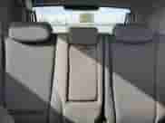 2009 Hyundai Tucson GLS with VIN KM8JM12B79U012399, listed as a Copart auction lot 77663414 with 164,615 mi miles and Salvage title. Bid and sale history available at DreamBid. Image 10.